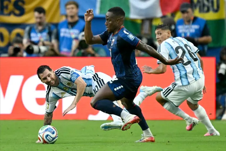 (FILES) Argentina's forward #10 Lionel Messi falls next to Cape Verde's forward #07 Jovane Cabral as they fight for the ball during the 2026 World Cup round of 32 football match between Argentina and Cape Verde at the Miami Stadium in Miami Gardens on July 3, 2026.