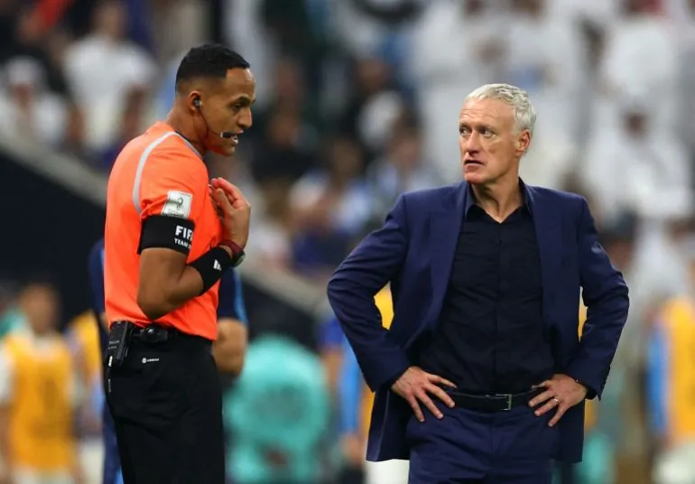 Soccer Football - FIFA World Cup Qatar 2022 - Final - Argentina v France - Lusail Stadium, Lusail, Qatar - December 18, 2022 France coach Didier Deschamps reacts towards fourth official Ismail Elfath REUTERS/Carl Recine